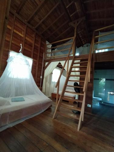 Postel nebo postele na pokoji v ubytování La tarima del colibri Ecolodge