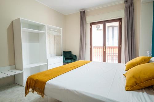 Posteľ alebo postele v izbe v ubytovaní Appartamento Nicoletta