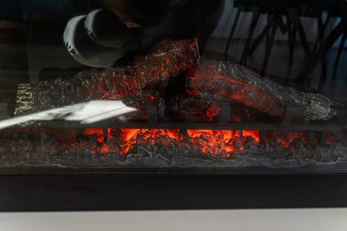 a lobster is being cooked in an oven at Cross Caraiman View 2 in Buşteni