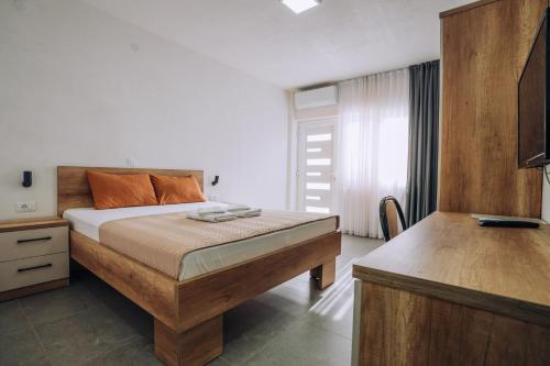 Ένα ή περισσότερα κρεβάτια σε δωμάτιο στο Apartments On The Top
