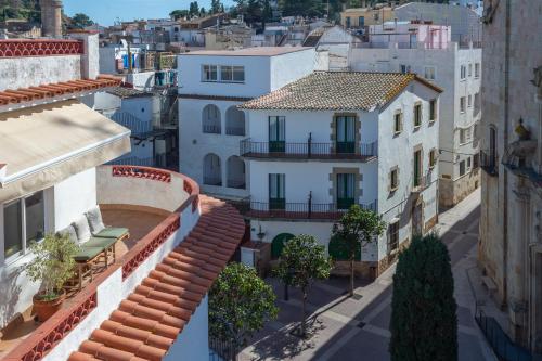 an aerial view of a city with buildings at Hostal Boutique Sa Nansa in Tossa de Mar