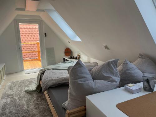 Postel nebo postele na pokoji v ubytování Ferienhaus Neuseenland