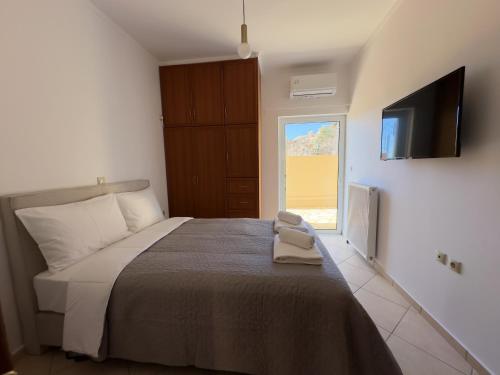 Postel nebo postele na pokoji v ubytování Eros Apartment Superb View