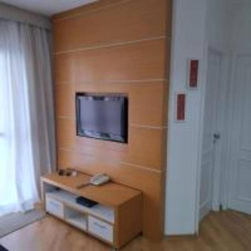 Телевизор и/или развлекательный центр в Get a Flat 94B Impecável - Berini SP
