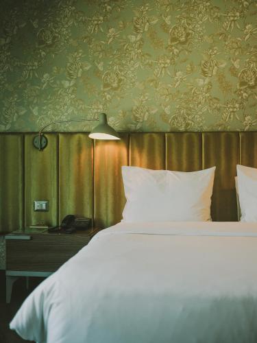 Postel nebo postele na pokoji v ubytování Hotel Eco Boutique Bidasoa