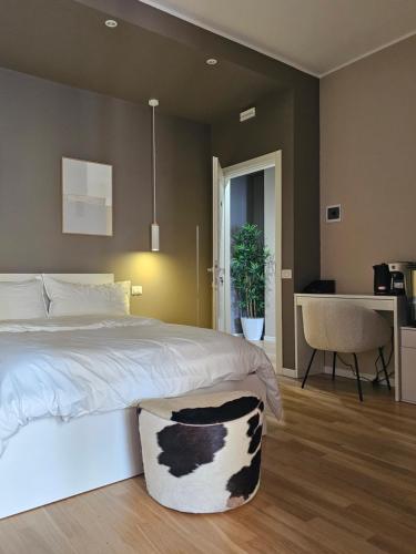Ένα ή περισσότερα κρεβάτια σε δωμάτιο στο Santrid Suites