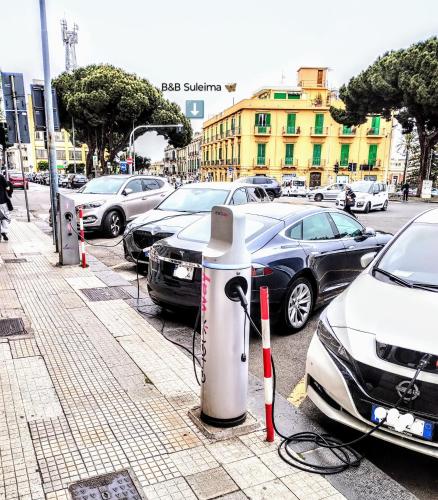 a bunch of cars parked in a parking lot at Suleima B&B Messina Centro in Messina