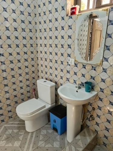 Ванная комната в Palm Grove lodge