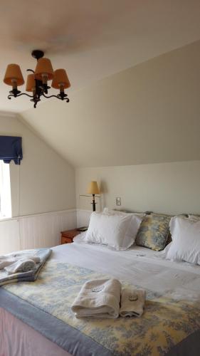 Кровать или кровати в номере Unique Lodge