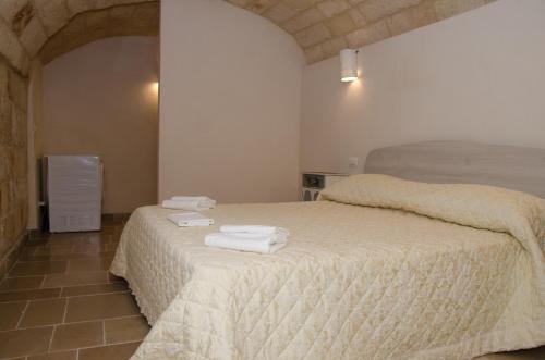 En eller flere senge i et værelse på CASA santa Caterina 38