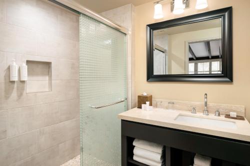 a bathroom with a sink and a shower at La Casa Del Zorro Resort & Spa in Borrego Springs