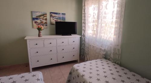 TV a/nebo společenská místnost v ubytování Villa Cambrils Beach