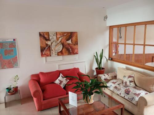 Zona de estar de Hotel Palermo Quintero