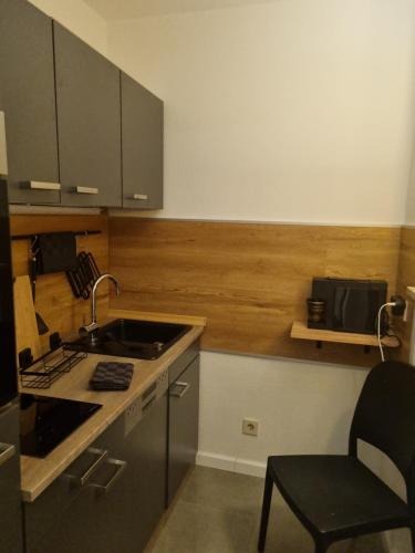 Kuchyň nebo kuchyňský kout v ubytování Apartment Chalet Bad Tölz