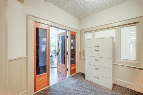 a walk in closet with a dresser and a drawer at Modern Blaine Condo Rental Less Than 1 Mi to Boat Harbor! in Blaine