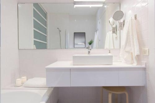 Ванная комната в Piso luminoso con vistas en el centro de Tarragona