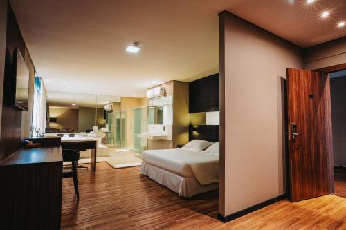 Catuai Hotel Cacoalにあるベッド