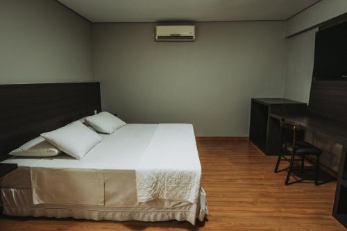 Catuai Hotel Cacoalにあるベッド