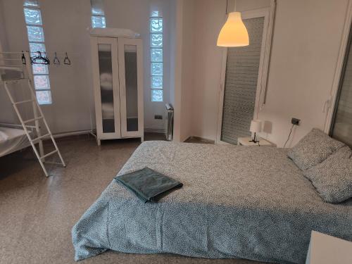 Кровать или кровати в номере Duplex con terraza