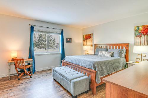 a bedroom with a bed and a desk and a window at Cozy Mtn Condo with Grill, 28 Mi to Wolf Creek! in Pagosa Springs