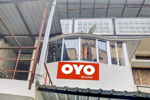 a boat in a building with a ovo logo on it at OYO Hotel Triveni. in Patna