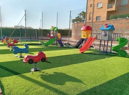 a playground with many different types of play equipment at شاليه للايجار بالساحل الشمالى in Marsa Matruh