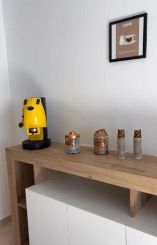 a wooden table with candles on top of it at KikaHome in Boscotrecase