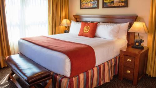 a hotel room with a large bed and a window at King Size bed Room with Hot tub in Gatlinburg