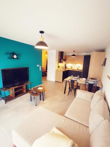 Ruang duduk di logement le ripaille T3