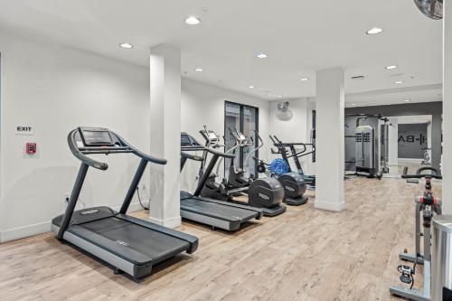 a gym with a row of treadms and cardio machines at Luxury 2BDR with Parking & Pool - Marina del Rey in Los Angeles