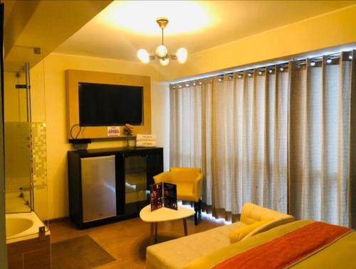 Katil atau katil-katil dalam bilik di LOS ARCES HOTEL
