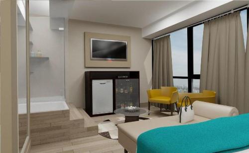 TV a/nebo společenská místnost v ubytování LOS ARCES HOTEL