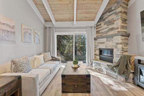a living room with a couch and a fireplace at Tahoe Bliss: Ski, Hike, & Relax in Incline Village