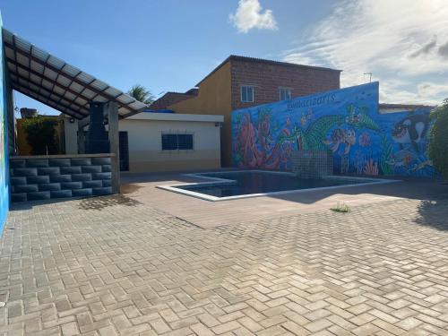 Bazén v ubytování Casa com piscina em Itamaracá nebo v jeho okolí