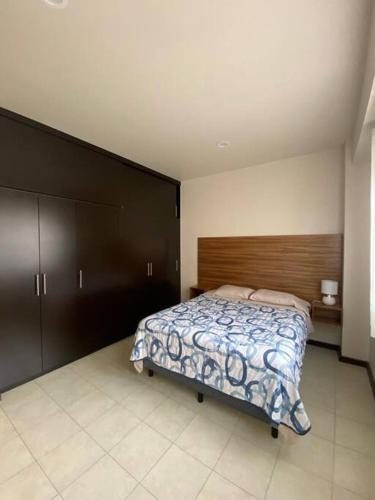 Postel nebo postele na pokoji v ubytování Departamento Oaxaca Bella