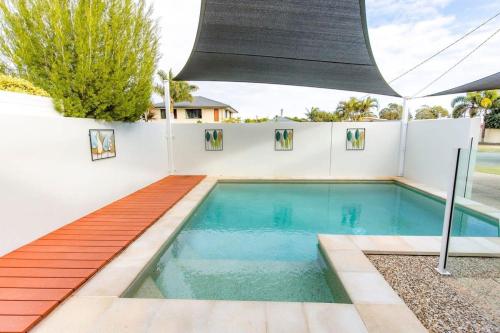 The swimming pool at or close to Golden Beach Family Home with Pool