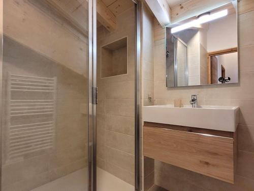 a bathroom with a sink and a shower at Appartement Les Gets, 3 pièces, 5 personnes - FR-1-598-162 in Les Gets