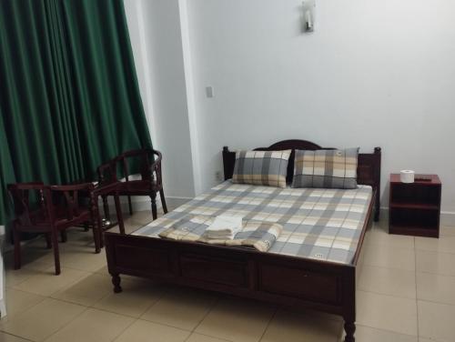 Postel nebo postele na pokoji v ubytování Sứ Lạng Hotel