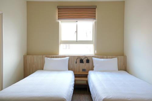 Cama o camas de una habitación en WDbnb