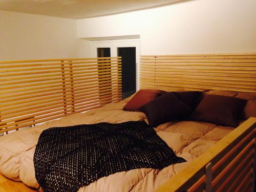 Postel nebo postele na pokoji v ubytování Como Studio Flat