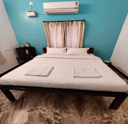 Uma cama ou camas num quarto em Maison Nataraja