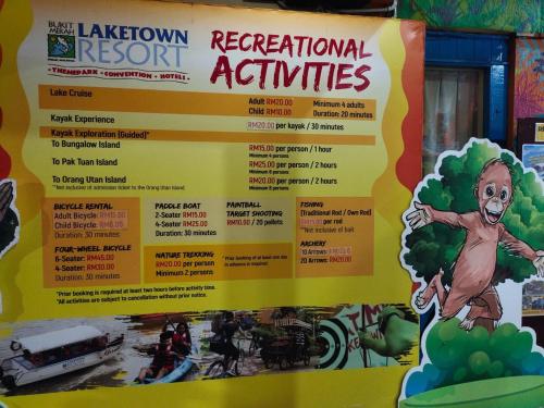 a poster for a recreation institute on a wall at Santorini by Loteloft at Bukit Merah Laketown in Simpang Ampat Semanggol