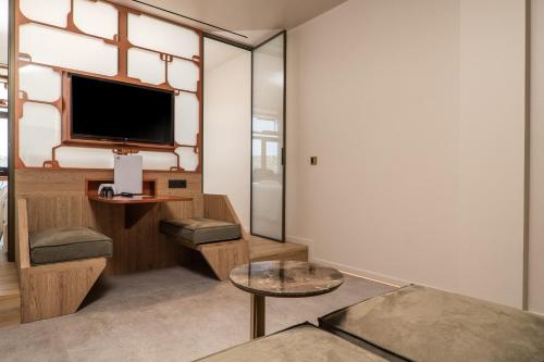 Oniros Residencesにあるテレビまたはエンターテインメントセンター