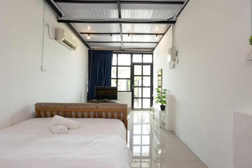 Llit o llits en una habitació de Casa for 2 - Private Studio Ipoh