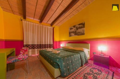 Posteľ alebo postele v izbe v ubytovaní Janas Country Resort