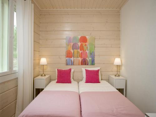 Postel nebo postele na pokoji v ubytování Karelian Country Cottages