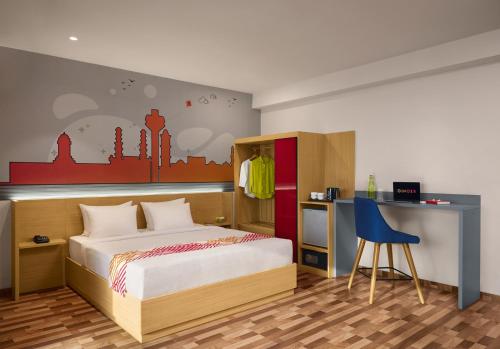 Cama o camas de una habitación en Ginger Ahmedabad Changodar