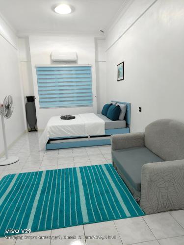 Кровать или кровати в номере Fontainebleau by Loteloft at Bukit Merah Laketown
