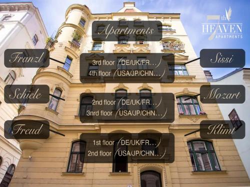 a building with signs on the side of it at 7th HEAVEN Vienna Center Apartments in Vienna