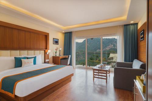 A bed or beds in a room at Zone Connect by The Park Mussoorie